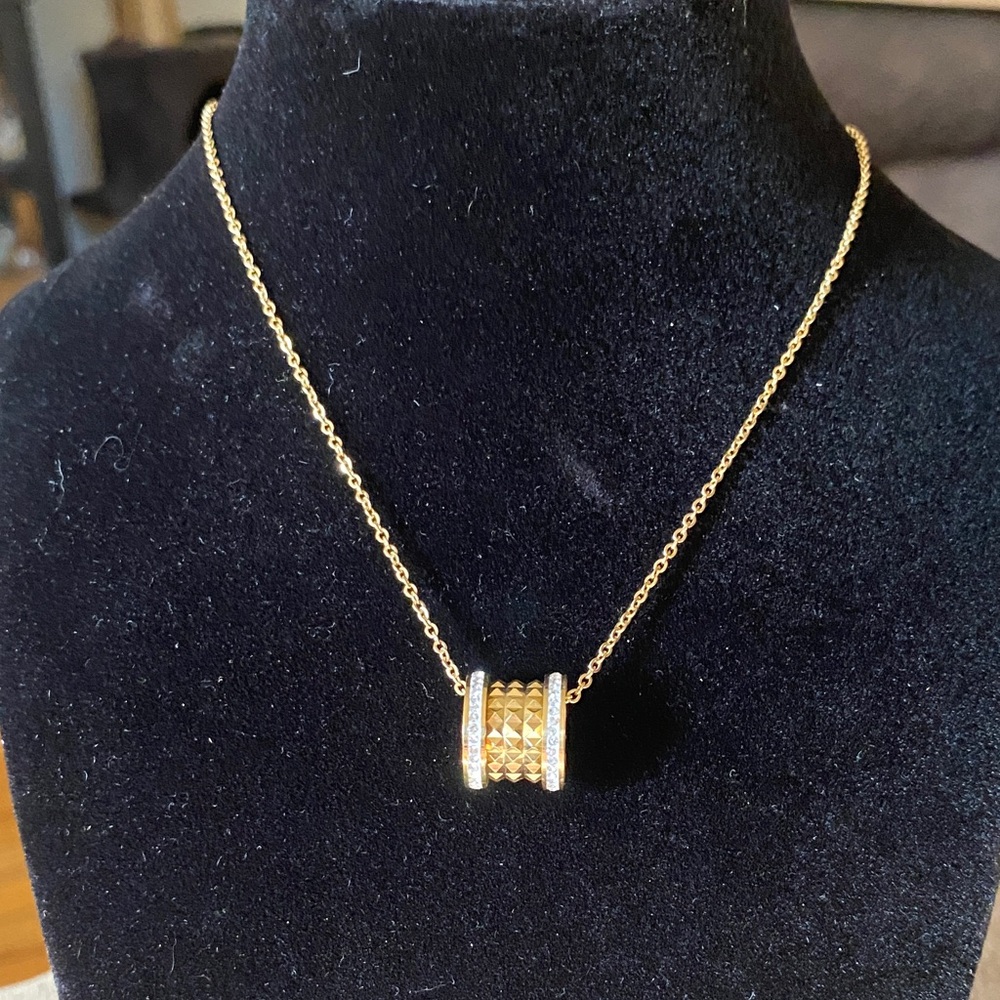 Elegant Gold Necklace with Silver Accents